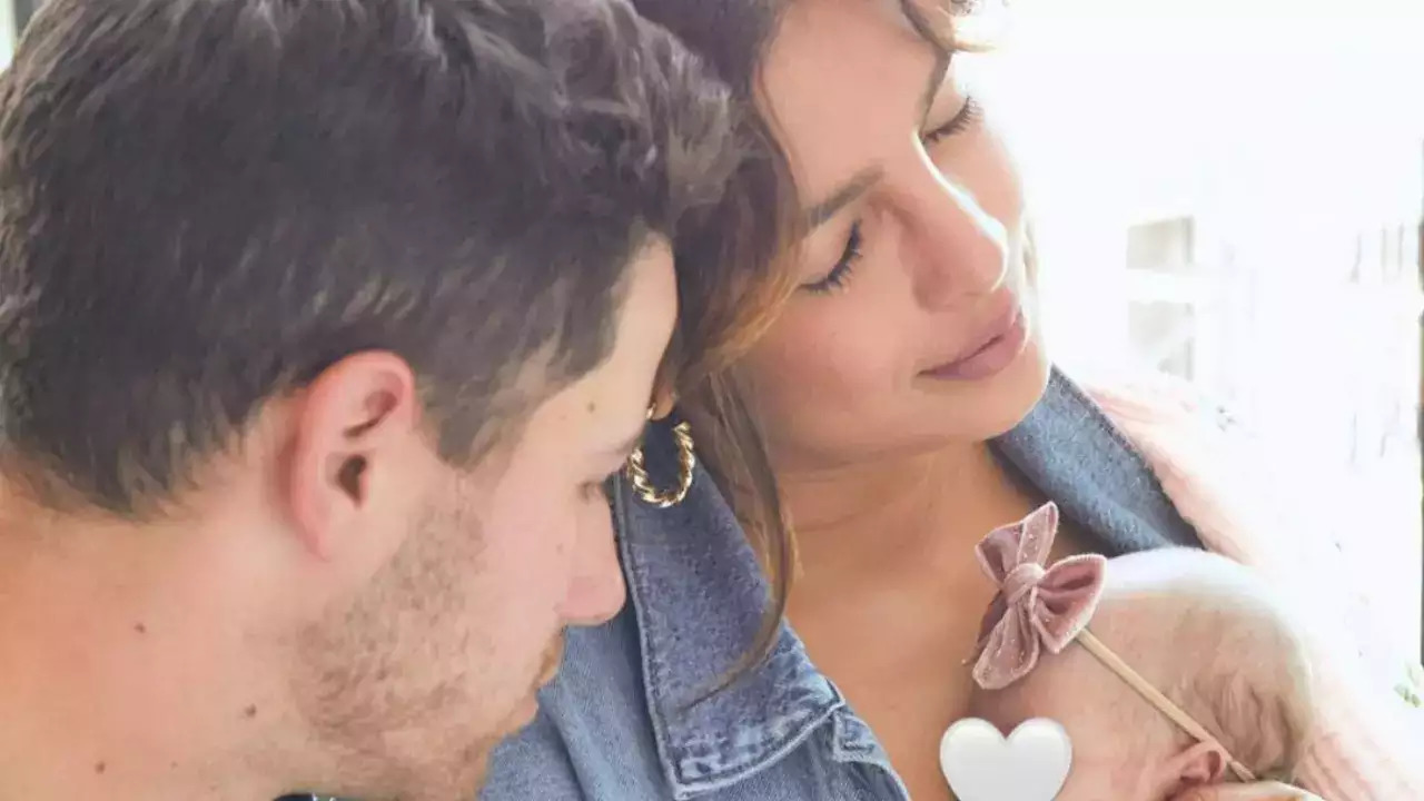 Nick Jonas and Priyanka Chopra with baby Malti