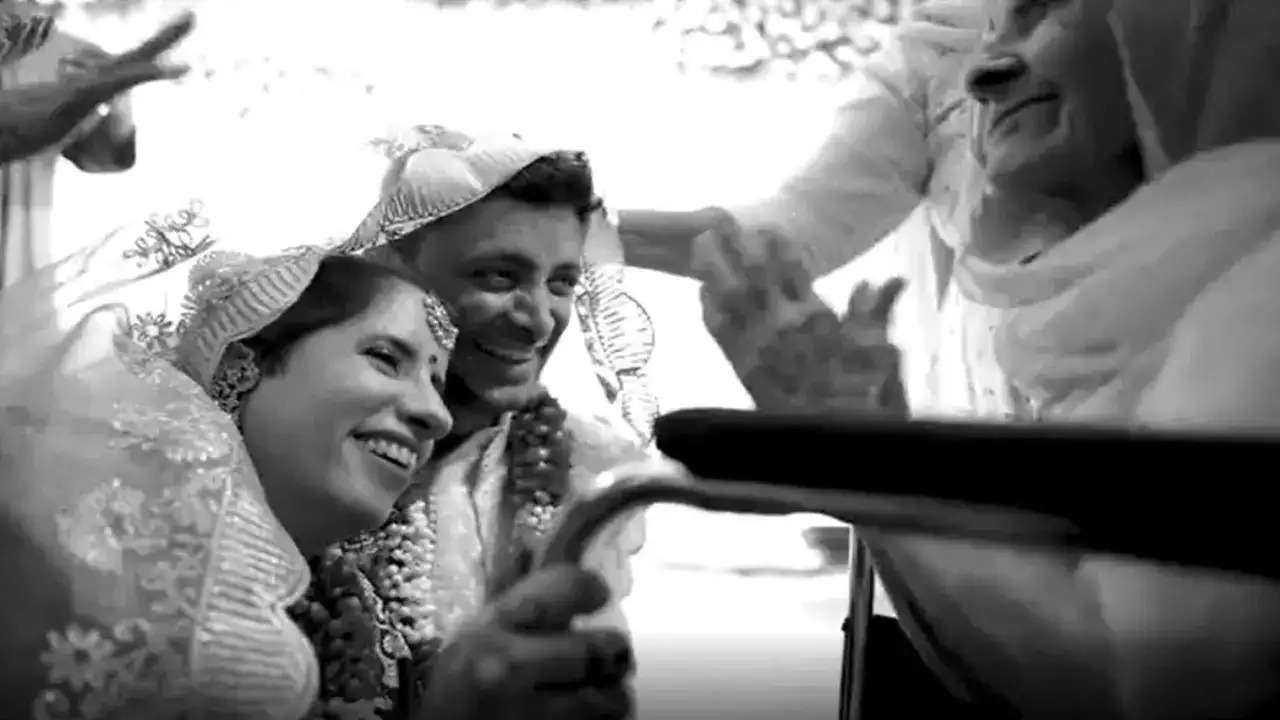 Guneet Monga with fiancé and his grandmother