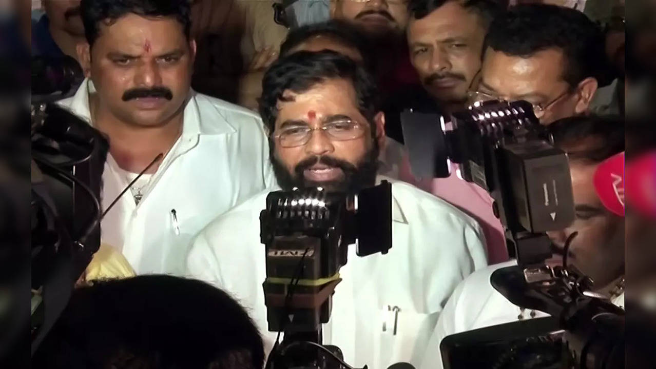 Surat, Jun 22 (ANI): Shiv Sena leader Eknath Shinde speaks to the media, in Sura...