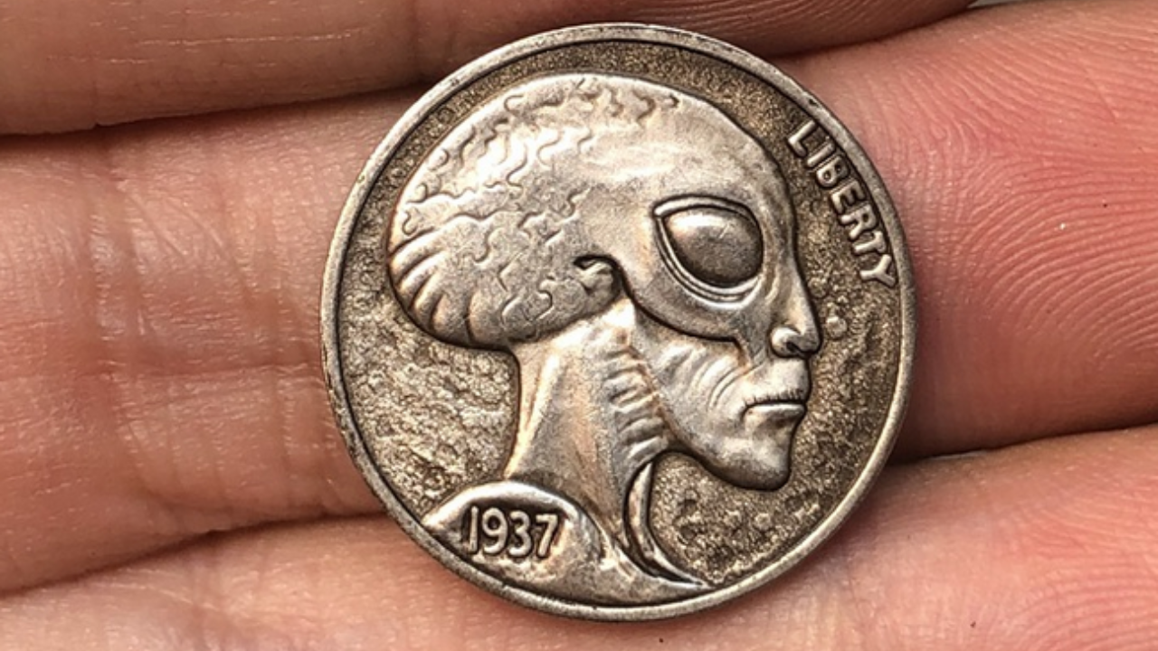 Man finds 'alien' coin in roll of quarters