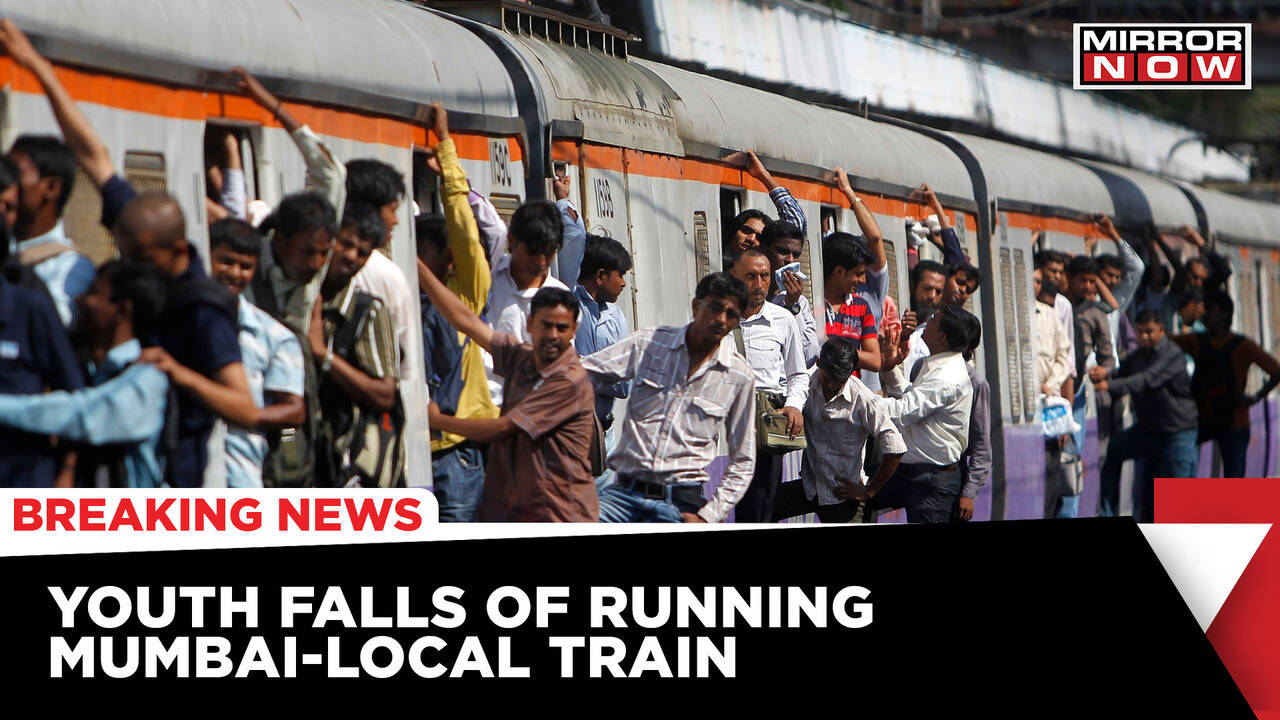 Mumbai News Youth Falls Off Local Train In Mumbai Visuals Go Viral
