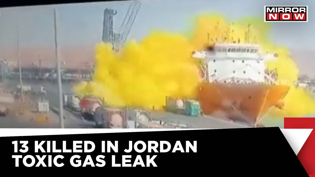 Crane Loading Chlorine Tanks Onto A Ship In Jordan's Port, Causing