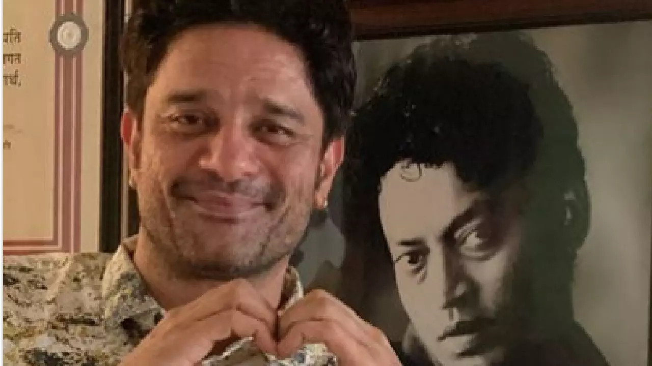 Jaideep Ahlawat poses in front of Irrfan Khan's portrait