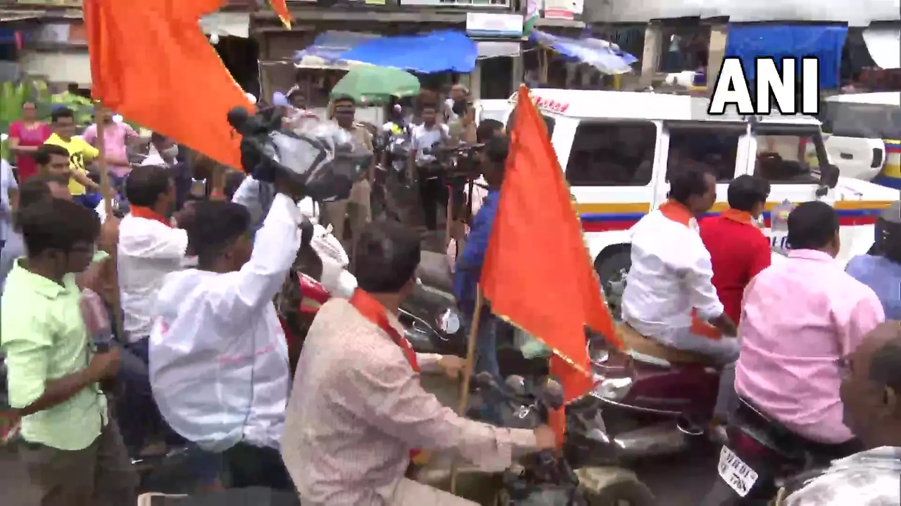 Shiv Sena workers hold bike rally to protest against the rebel shiv sena MLAs outside the Saamana office in Mumbai on June 26