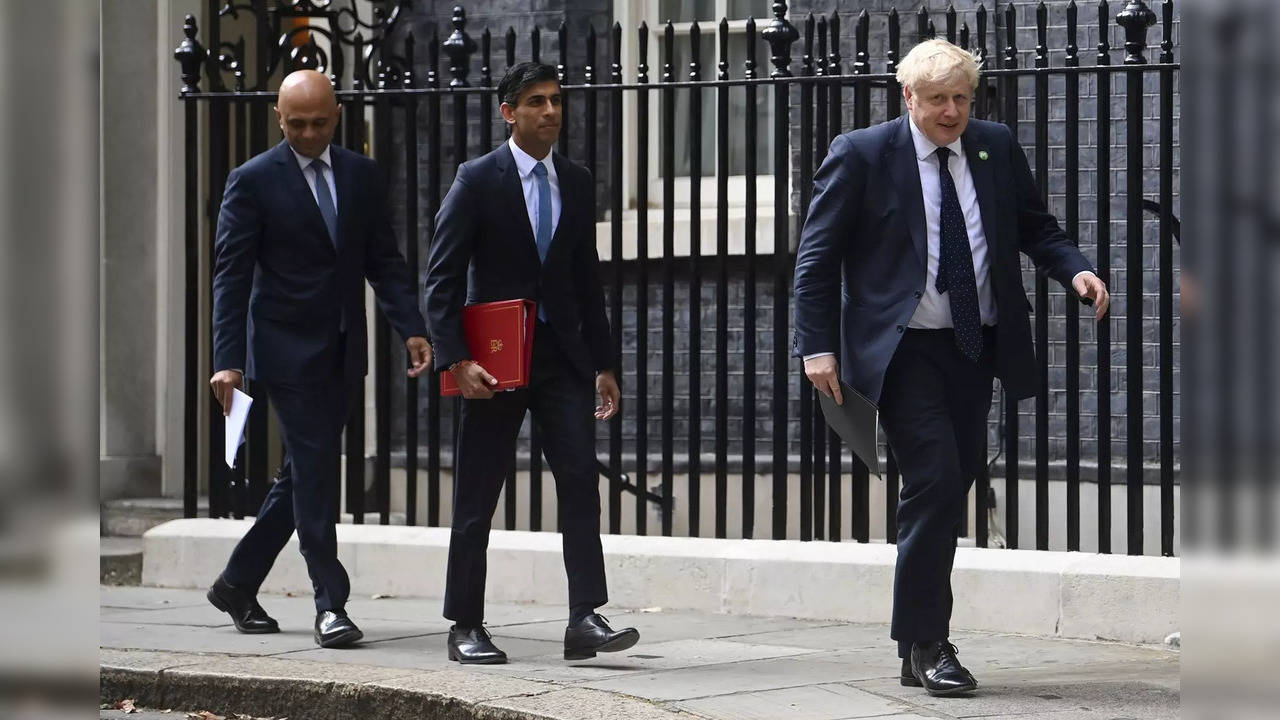 FILE - From left, British Health Secretary Sajid Javid, Chancellor of the Excheq...