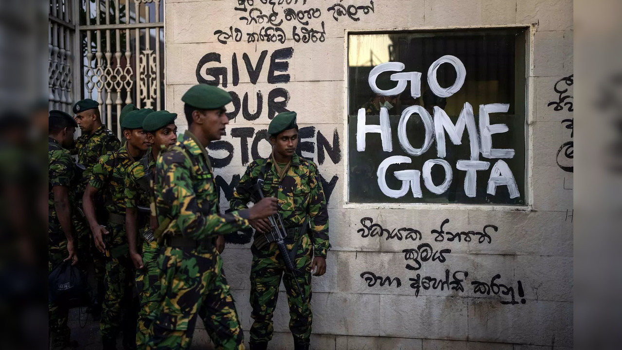 Sri Lanka army soldiers patrol near the official residence of president Gotabaya...