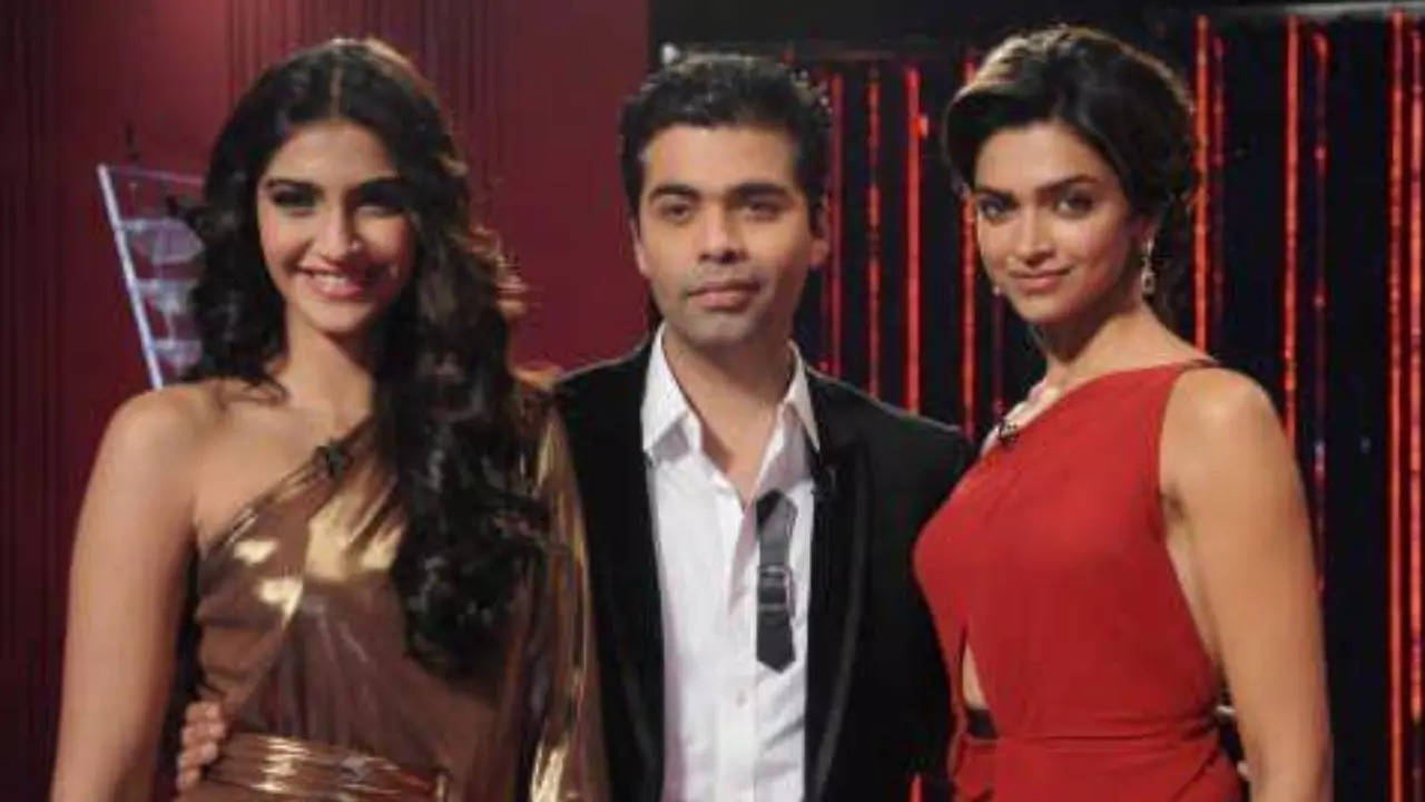 Karan Johar with Deepika Padukone and Sonam Kapoor