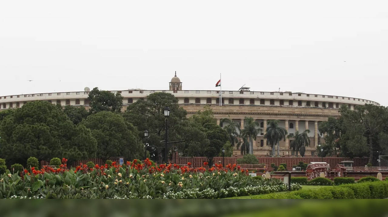 New Delhi: Indian national flag flies half-mast at Parliament as the country mourns the death of former Japanese PM Shinzo Abe, in New Delhi on Saturday, July 09, 2022. India is observing a one-day State Mourning on Saturday throughout the country as a mark of respect for Abe. (Photo: Wasim Sarvar/IANS)