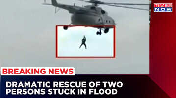 Dramatic Rescue On Camera Of 2 Persons Stuck In Flood Water Of Godavari In Chennoor