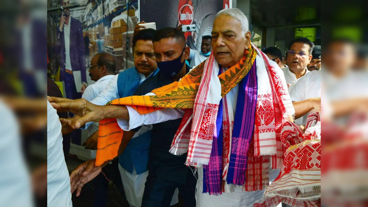 Guwahati: Yashwant Sinha, who is the consensus candidate of the opposition for the presidential election being welcomed upon his arrival at LGBI airport in Guwahati on Wednesday, July 13, 2022. (Photo: Anuwar hazarika/IANS)