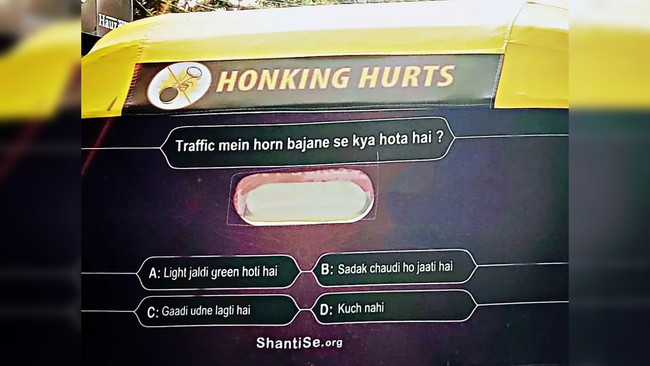 'Traffic mein horn bajane se kya hota hai (What happens when you honk in traffic)?' asks a KBC-style poll behind an auto in Delhi | Picture courtesy: Twitter/@tunkuv