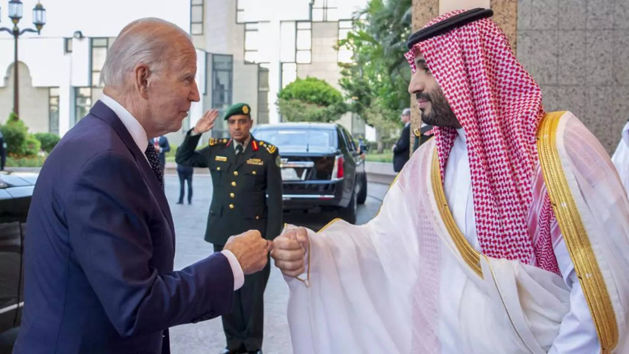 US President Joe Biden fist-bumps Mohammed bin Salman