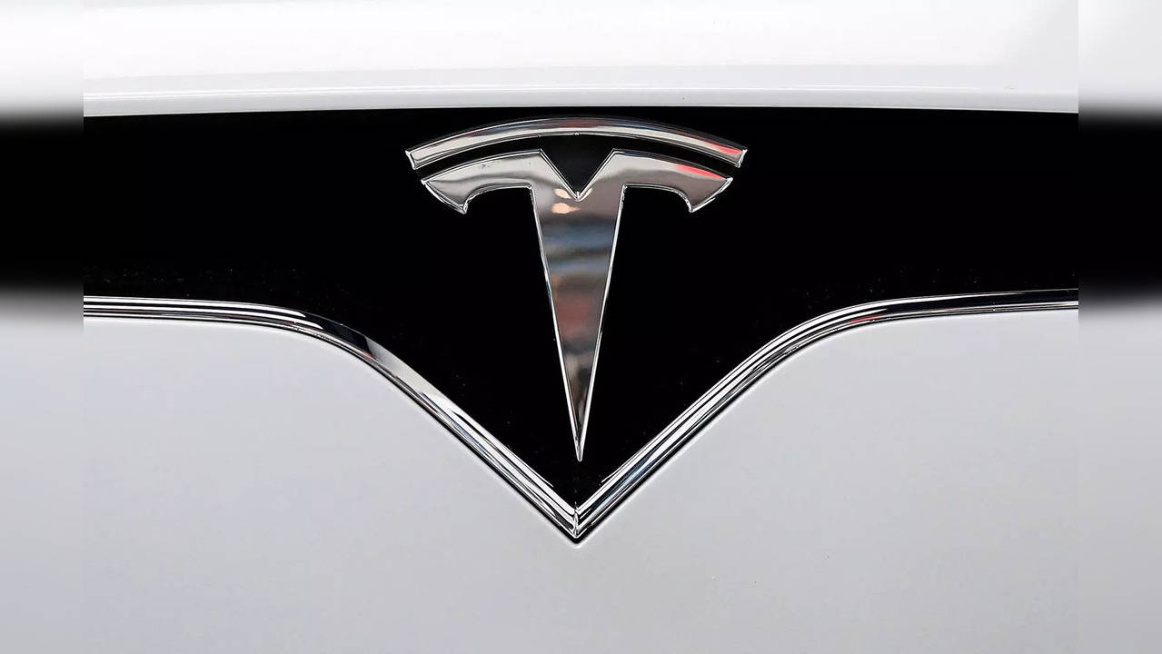 FILE PHOTO: The Tesla logo is seen on a car at Tesla Motors' new showroom in Manhattan's Meatpacking District in New York