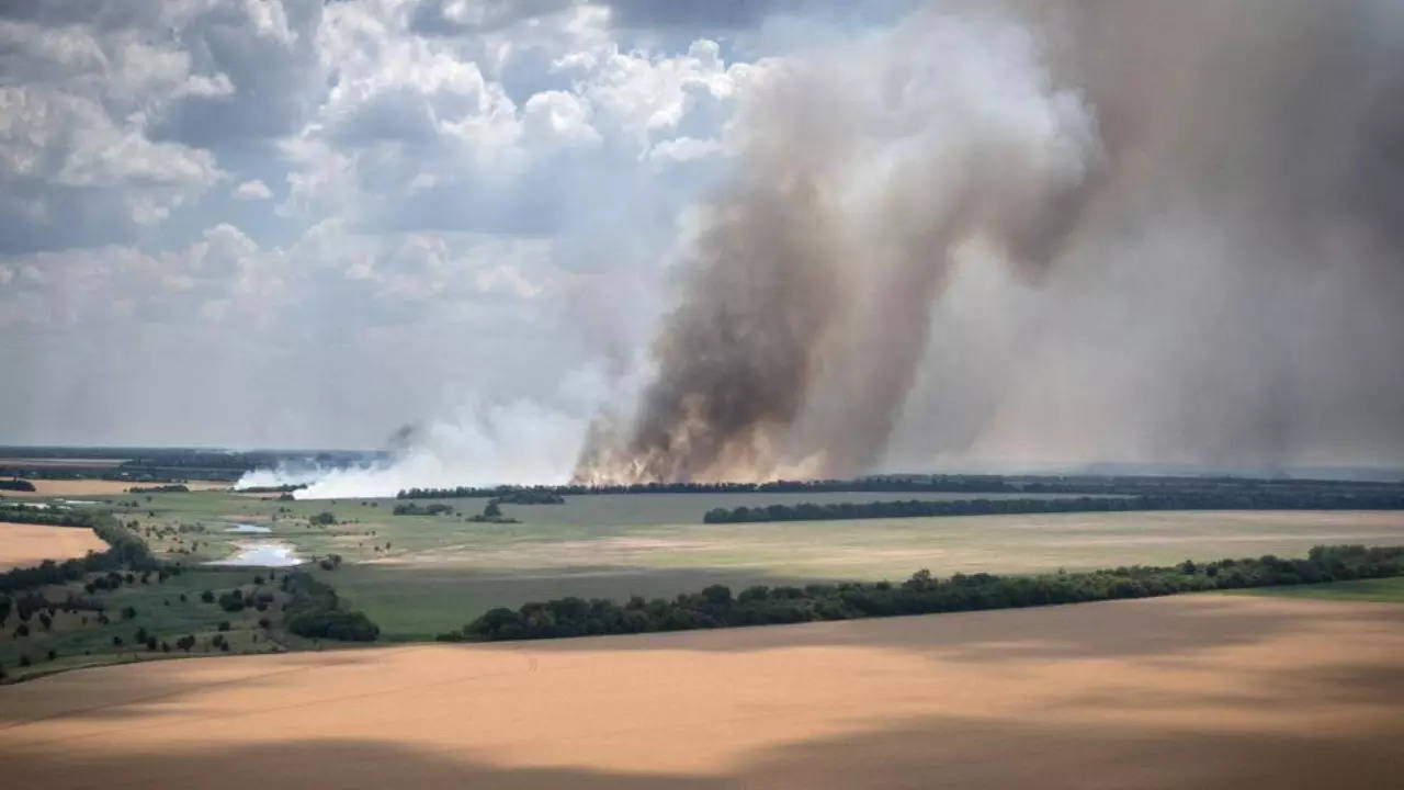 Smoke arises from Ukrainian farms