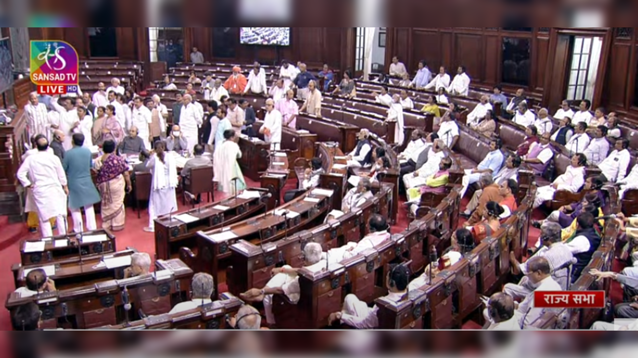 ​ Opposition MPs reach the well of the Upper House demanding discussion on the issues of inflation and the recent GST rate hike​​