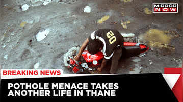 Danger of potholes in Thane, death of a rider due to bike falling in pits Latest news