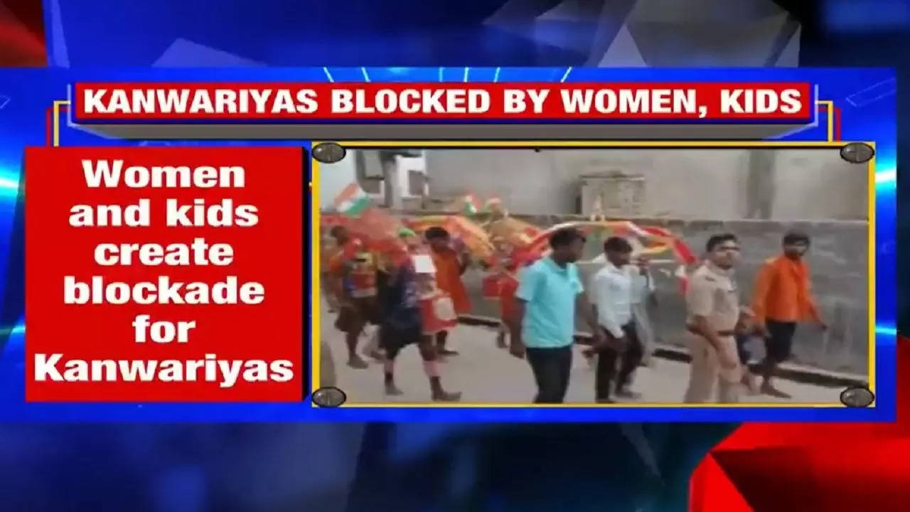 ​Women and kids placed cots as barricades on the road.