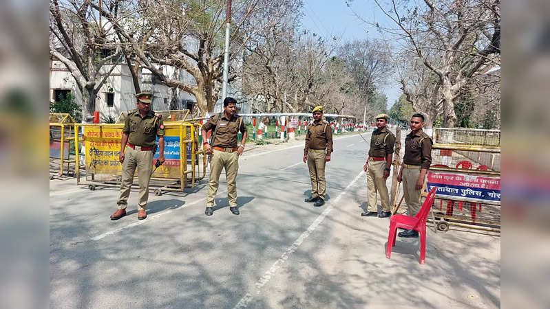 Gorakhpur, Mar 09 (ANI): Uttar Pradesh Police personnel stand guard near votes c...