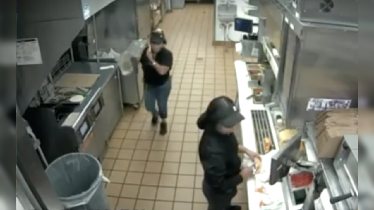 Caught on camera Shocking moment fast food restaurant manager throws