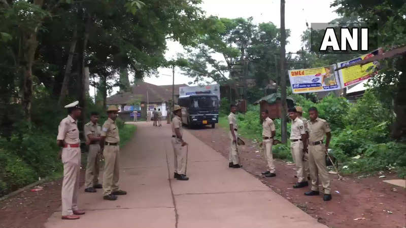 ​Police deployed near government hospital in Puttur where mortal remains of BJP Yuva Morcha worker Praveen Nettaru had been kept