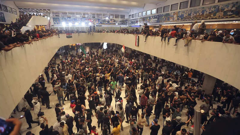 Iraqi protesters fill the Parliament building in Baghdad