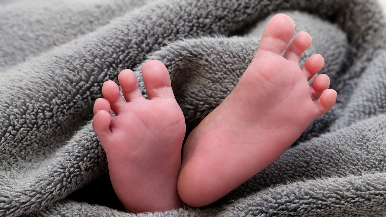 UP Woman throws infant in front of tractor to stop it during property