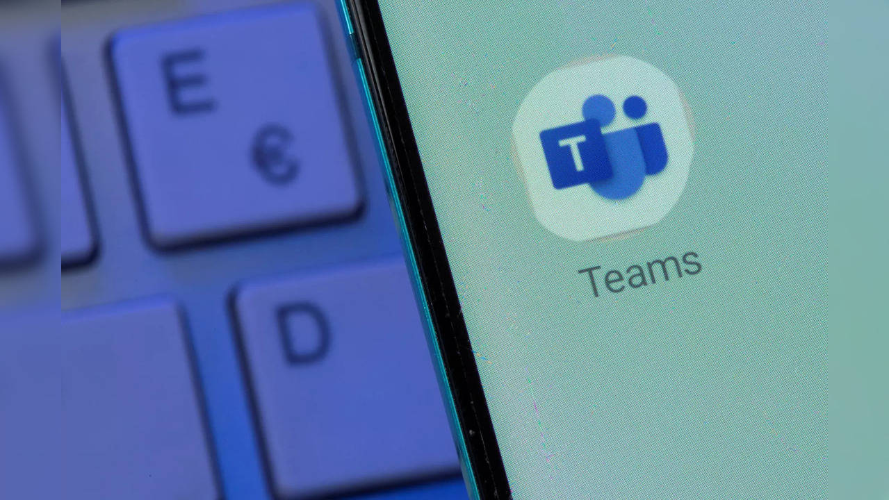 Microsoft Teams app is seen on the smartphone placed on the keyboard in this illustration taken. ( Image source: Reuters)