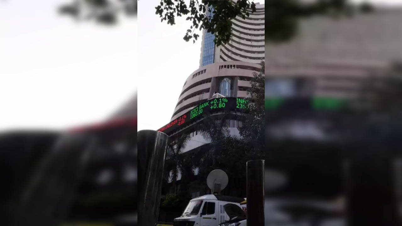 Benchmarks end flat; Nifty slips below 17,400
