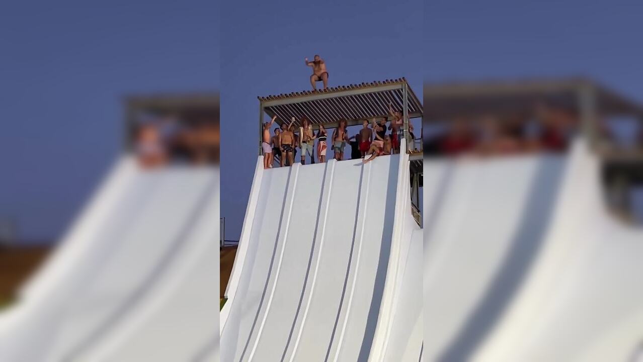 Viral video: Man jumps onto waterslide, shoots up in air before ...