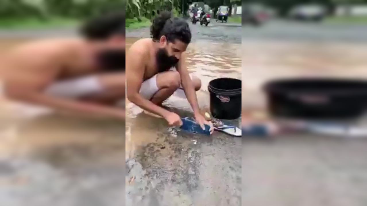 Viral video: Kerala man takes mud bath, does yoga in pothole in front of MLA