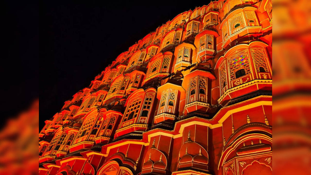 A nighttime view of illuminated Hawa Mahal in Jaipur