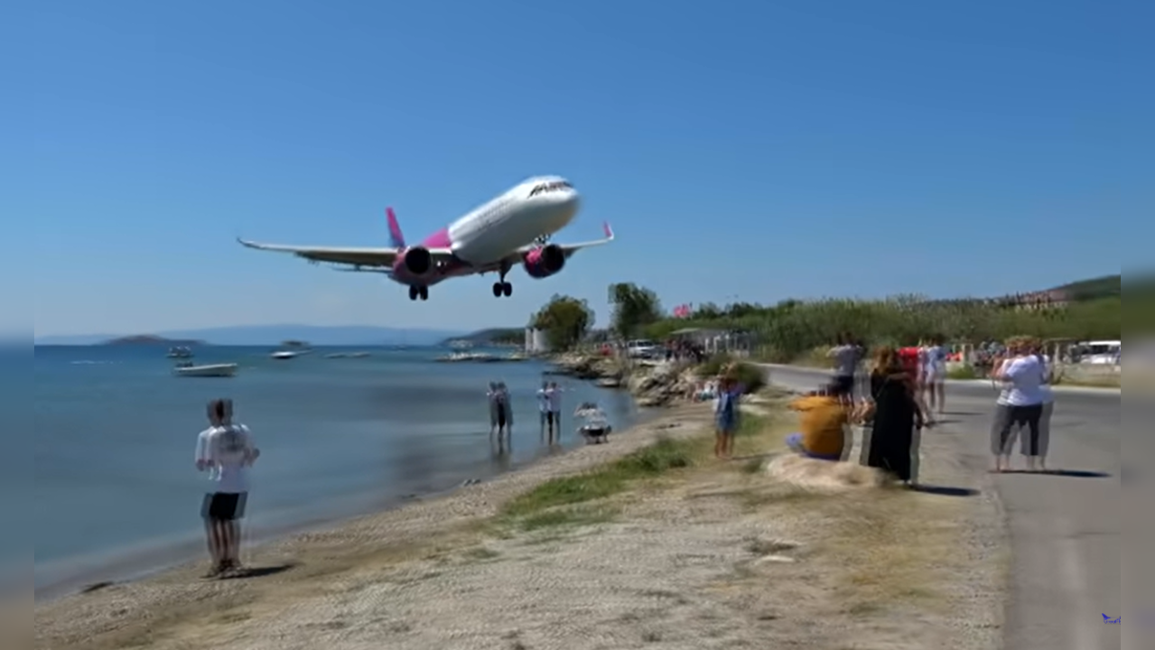 Jawdropping footage shows plane making 'lowest ever landing' at