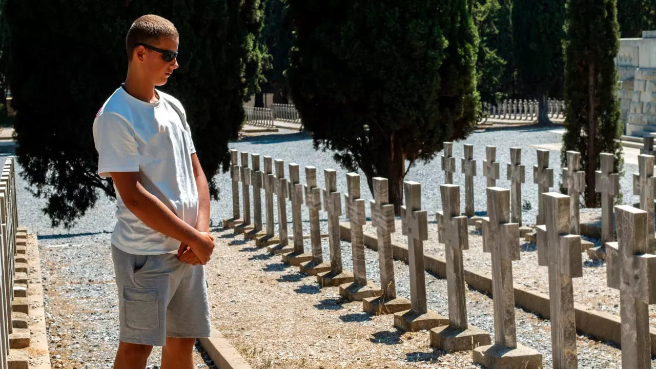 Man visits graveyard