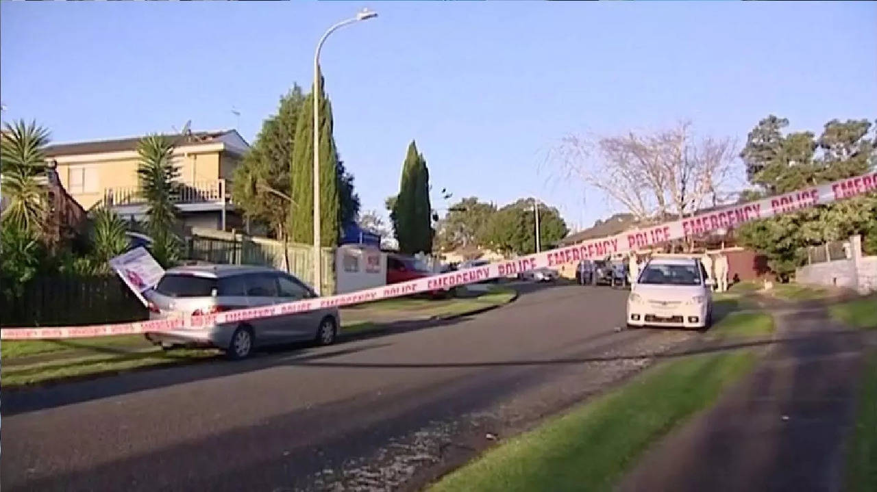 A view of a police cordon at the scene where suitcases with the remains of two children were found, after a family, who are not connected to the deaths, bought them at an online auction for an unclaimed locker, in Auckland, New Zealand.