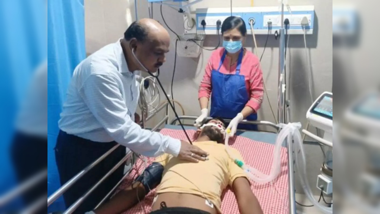 Dr Sadanand Raut treats a snake-bite patient at his medical facility