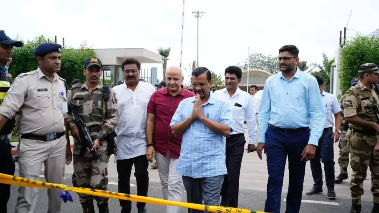 Delhi Chief Minister Arvind Kejriwal and Deputy Chief Minister Manish Sisodia at the Ahmedabad airport on Monday