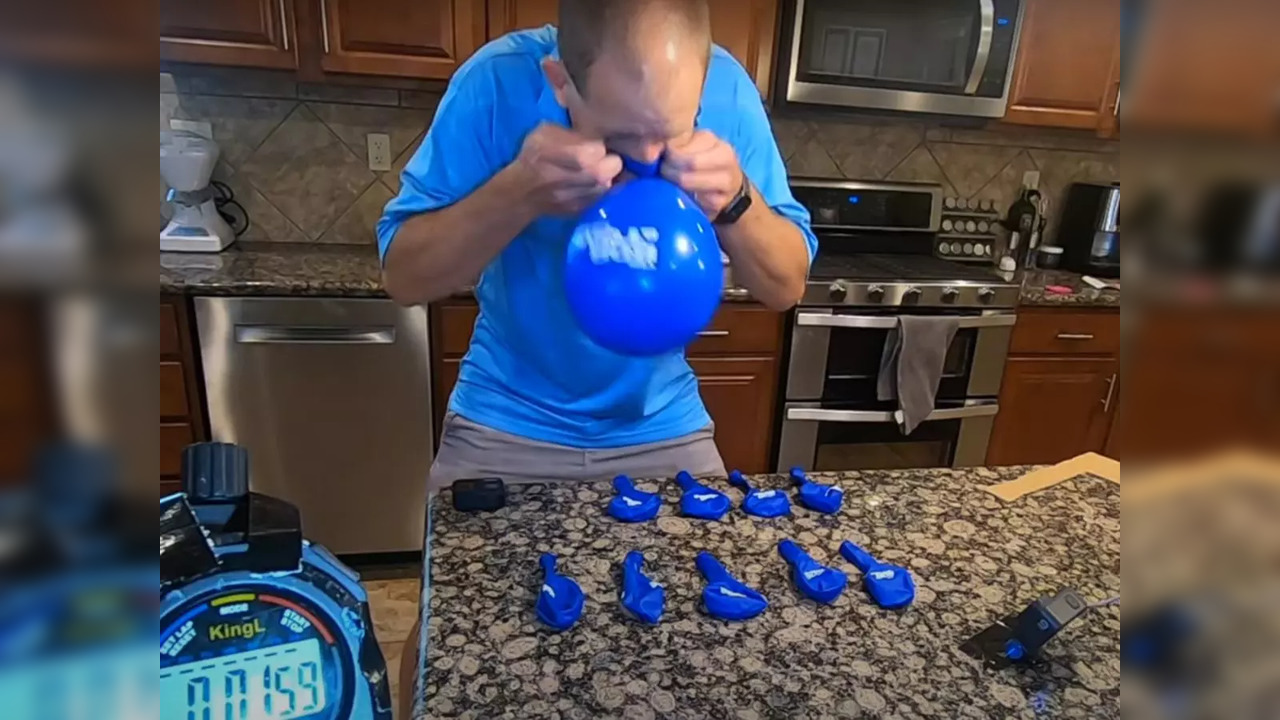 Man with nearly 250 Guinness World Records inflates 10 balloons in 60 seconds | Picture courtesy: David Rush