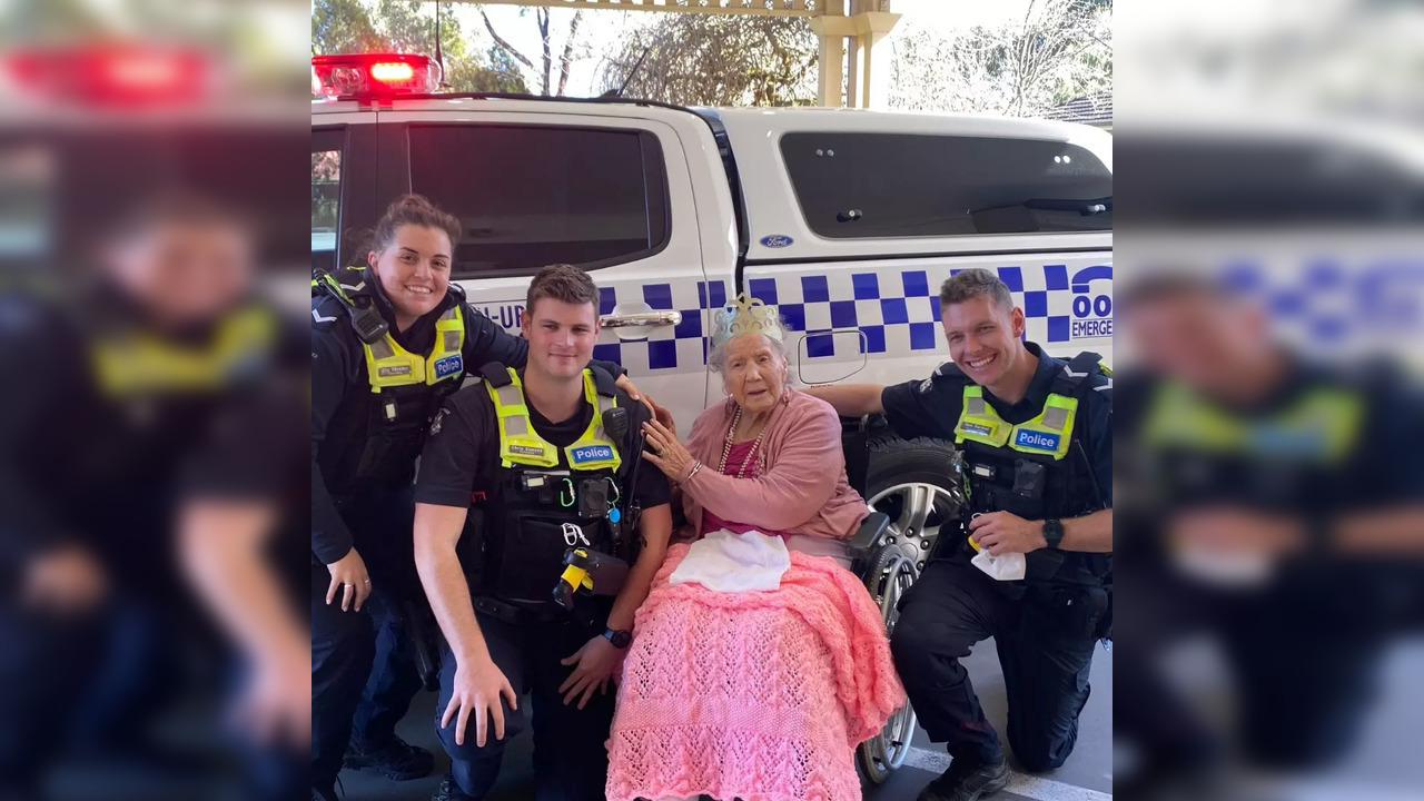 Jean Bickenton with officers of Victoria Police