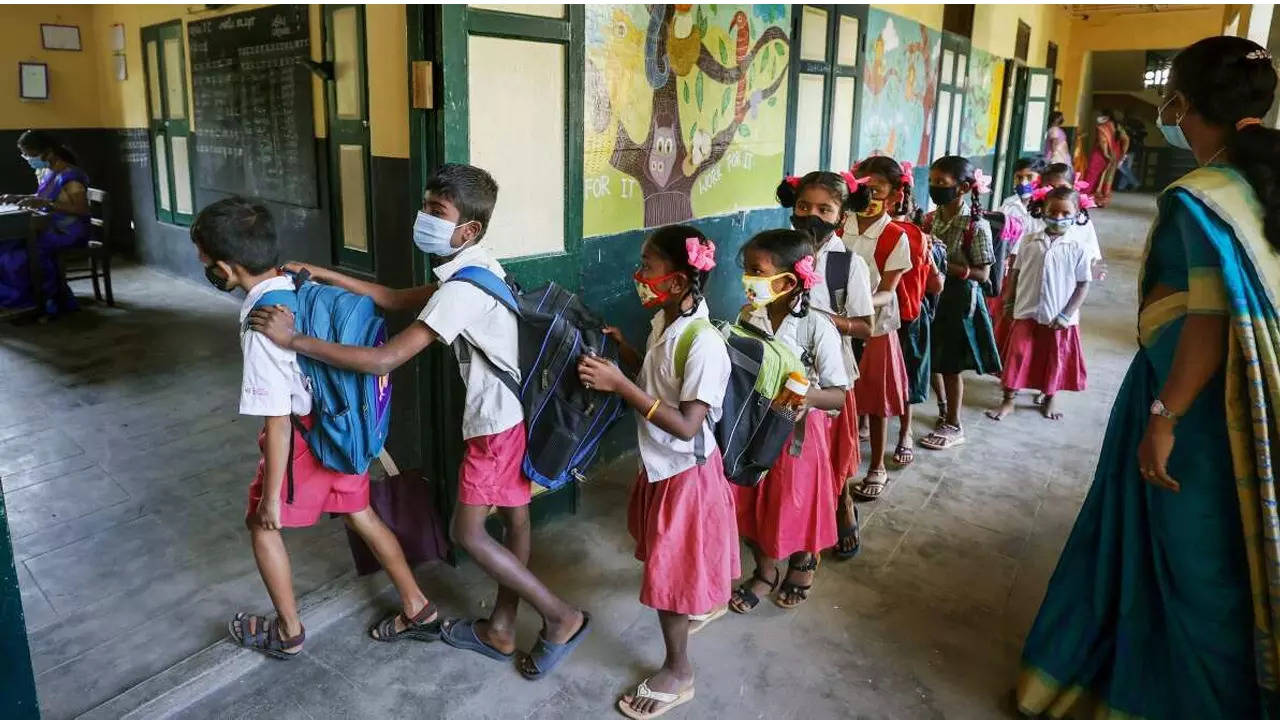 Students entering classes at a school in Chennai.