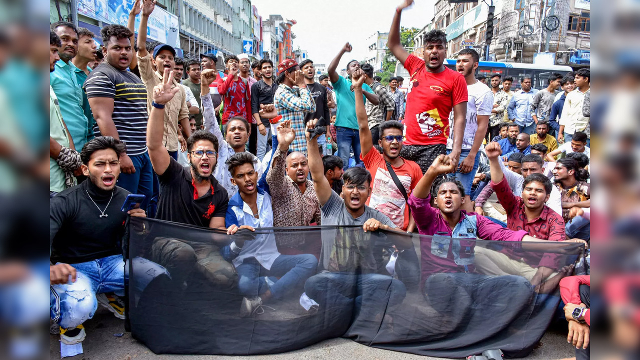 Hyderabad: Activists stage a protest against Telangana's BJP MLA T Raja Singh fo...