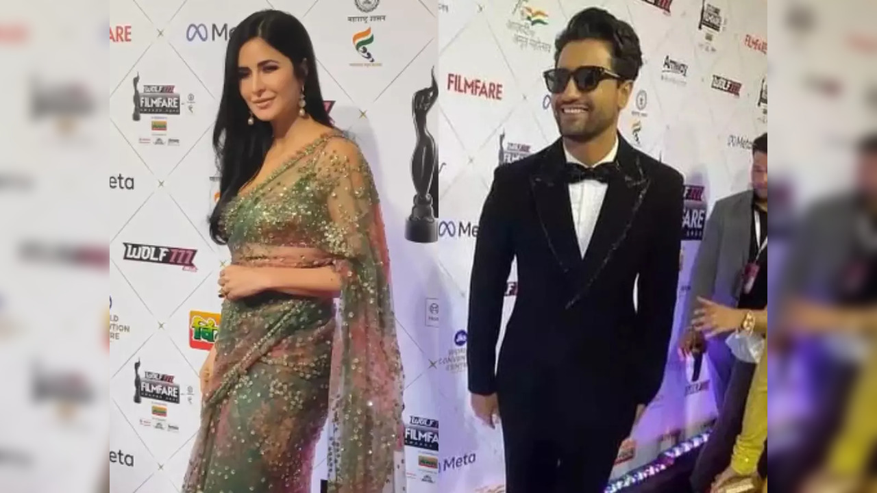 Katrina is a sight to behold as she attends 67th Wolf777news Filmfare Awards 2022; Vicky looks dapper in tux - watch