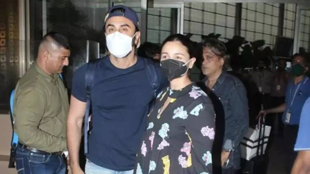 Alia Bhatt clicked in the city in a brown wrap around dress with hubby Ranbir  Kapoor in an all black look consisting of a t-shirt and denims Media