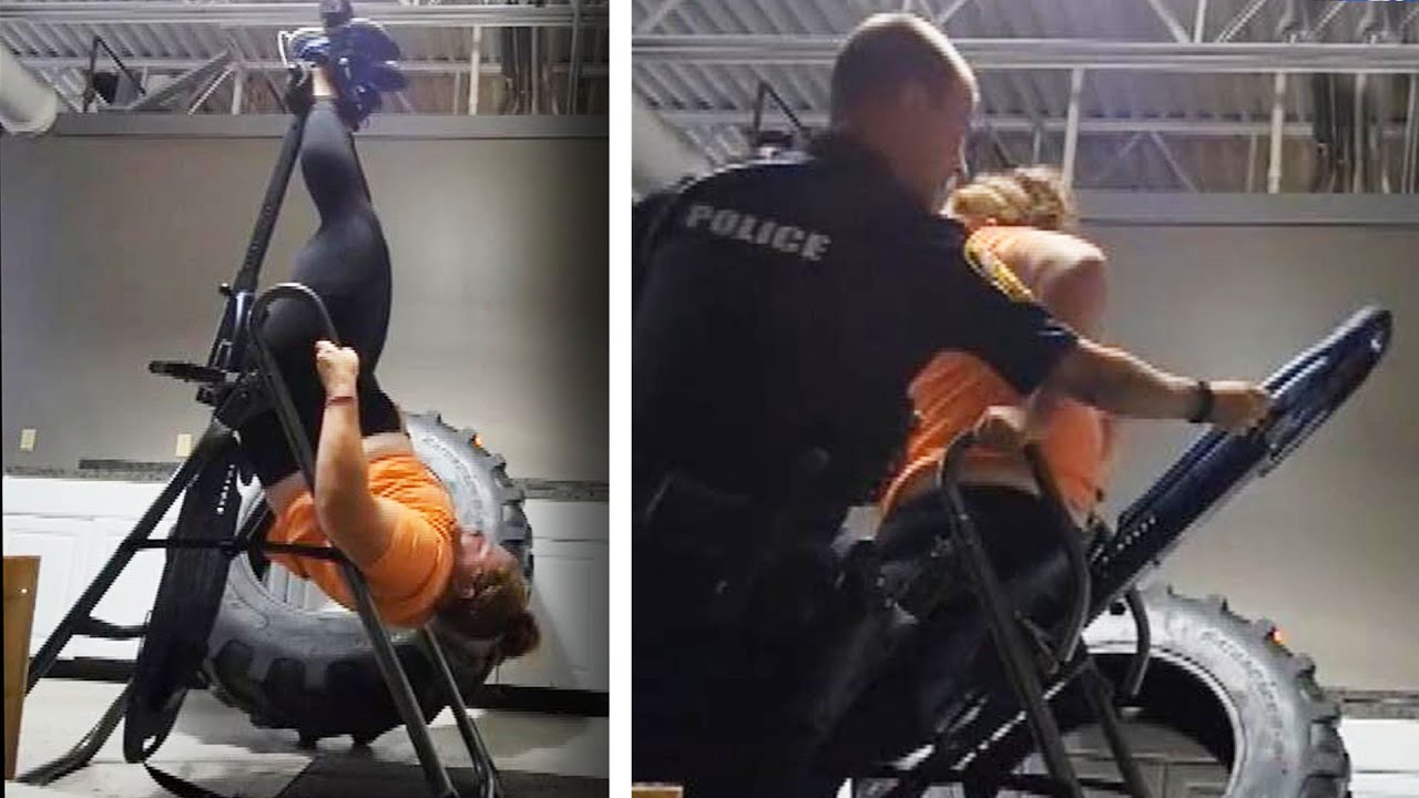 Woman gets stuck upside down in gym equipment