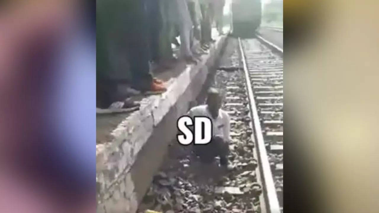 Man gets up from the tracks