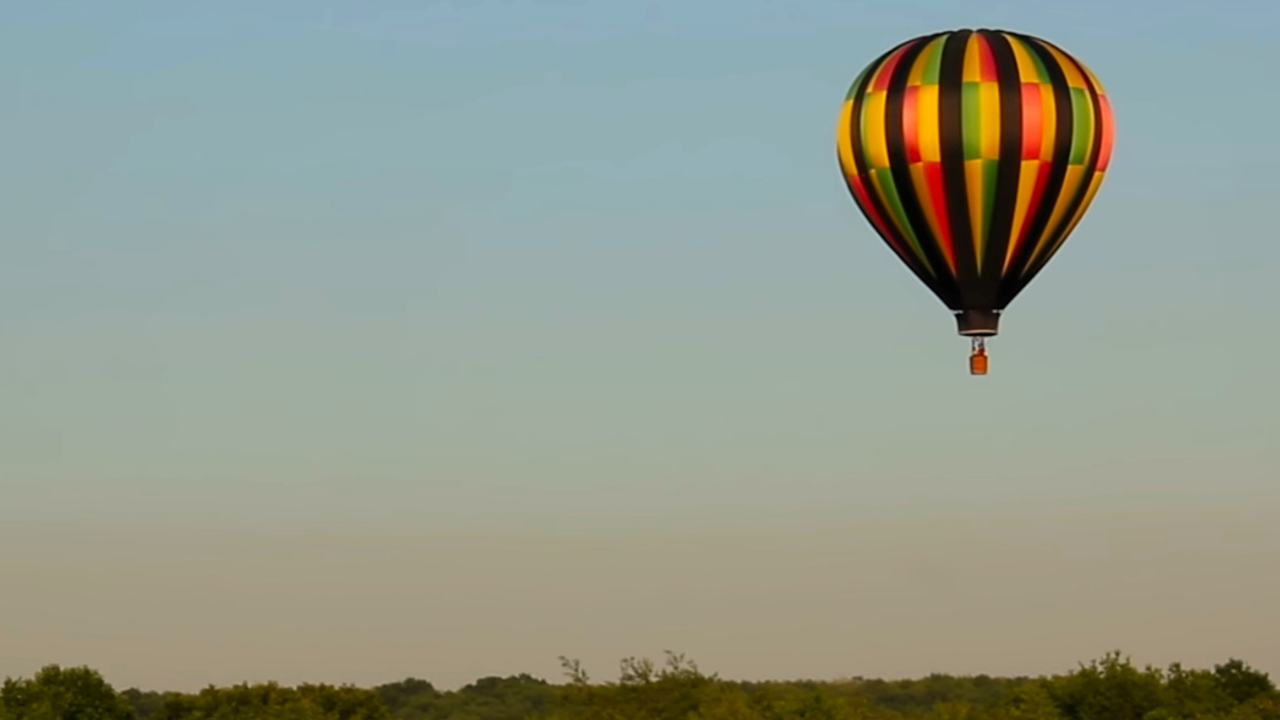 Chinese man trapped in balloon