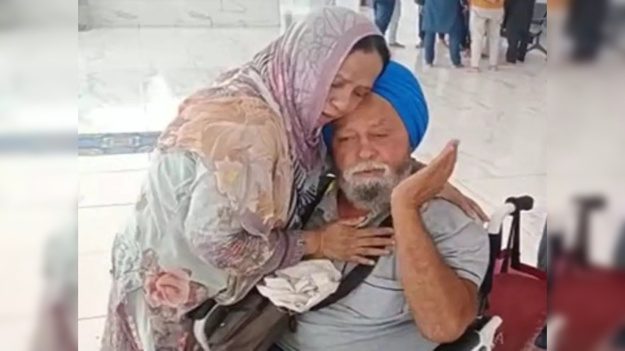 Indian Sikh brother meets Pakistani Muslim sister: Kulsoom Akhtar pictured hugging Amarjit Singh | Photo courtesy: Twitter/@Dsrcf3