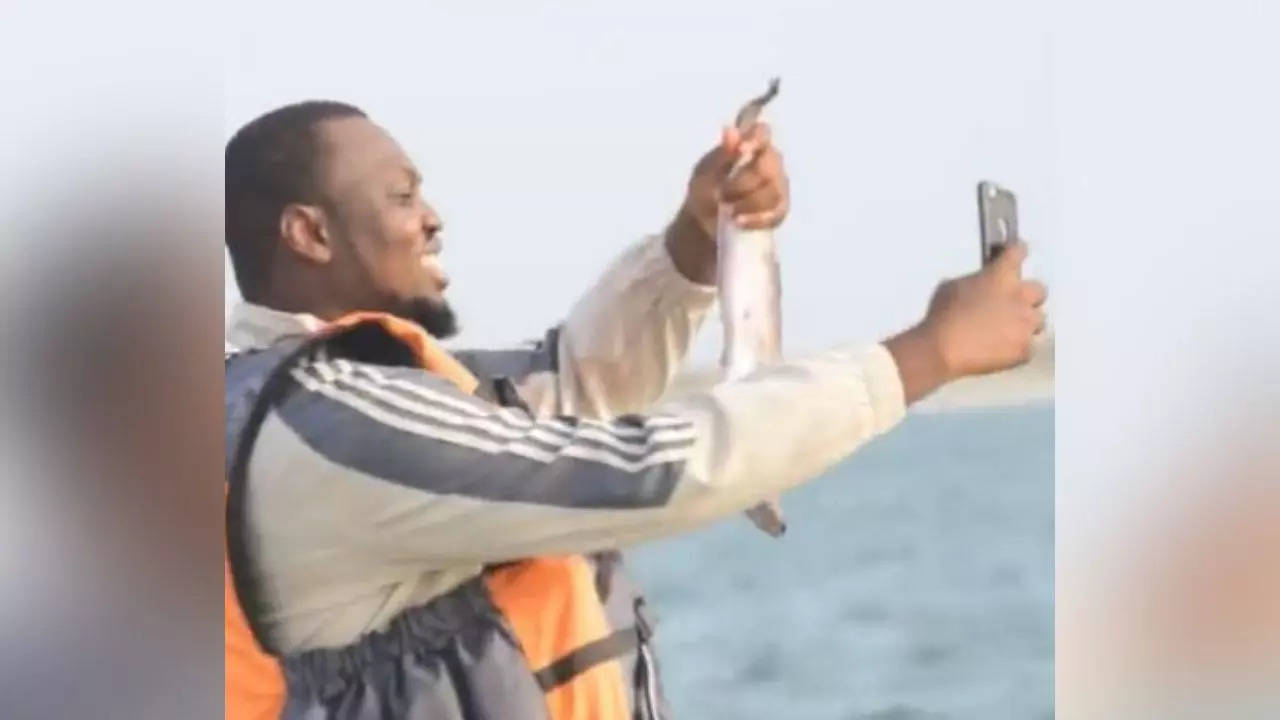 Man throws phone in water