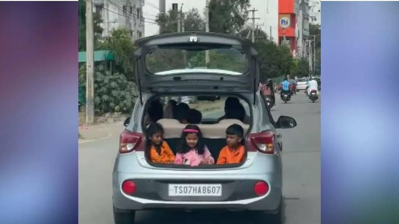 Kids in open boot