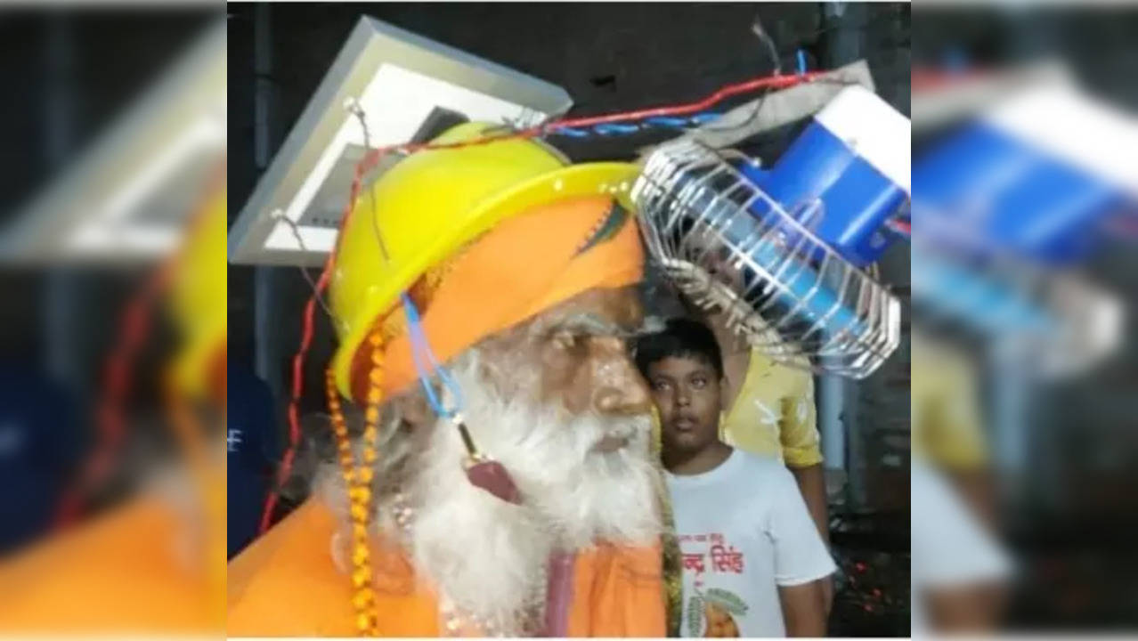 UP flower seller invents fan-fitted helmet