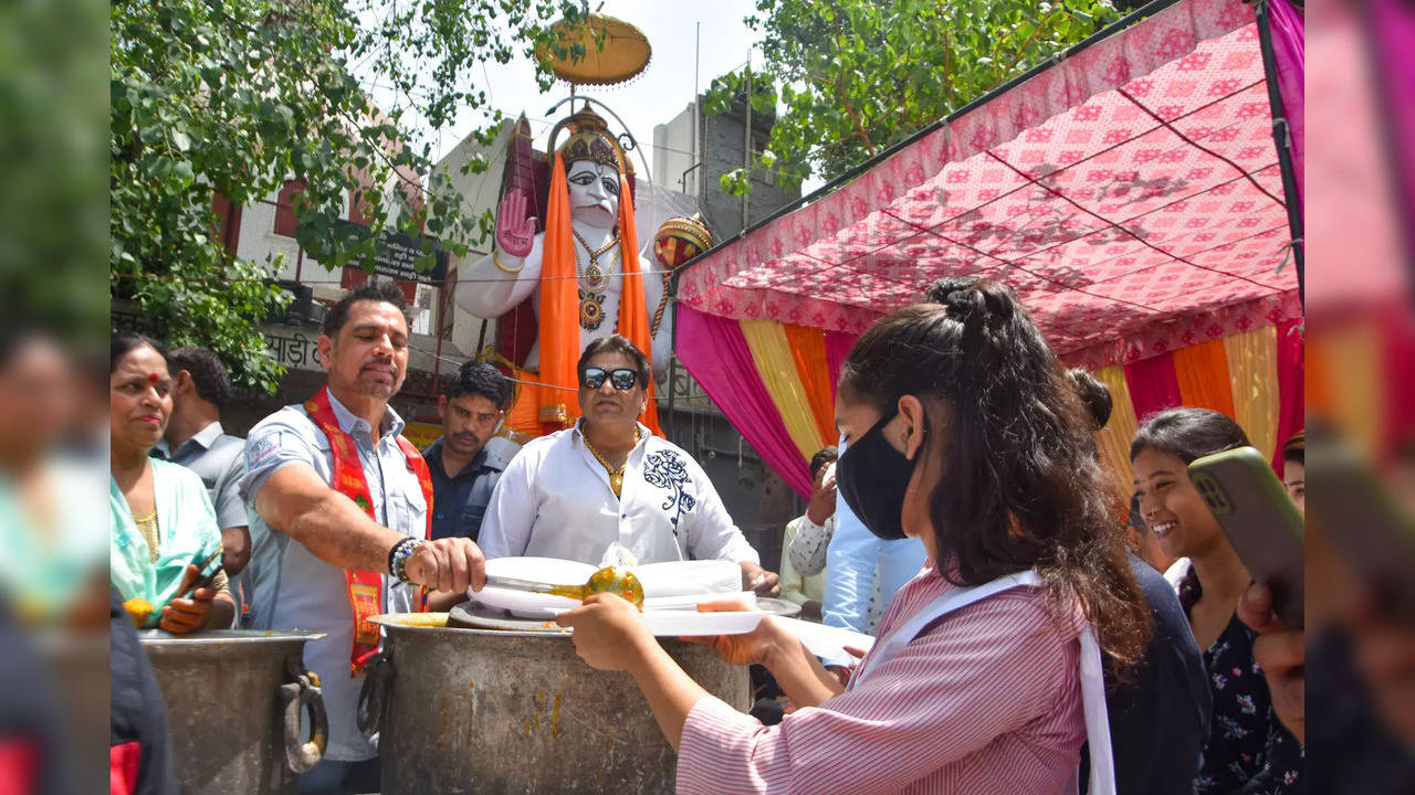 New Delhi: Businessman Robert Vadra serves 'langar' on the occasion of Hanuman J...